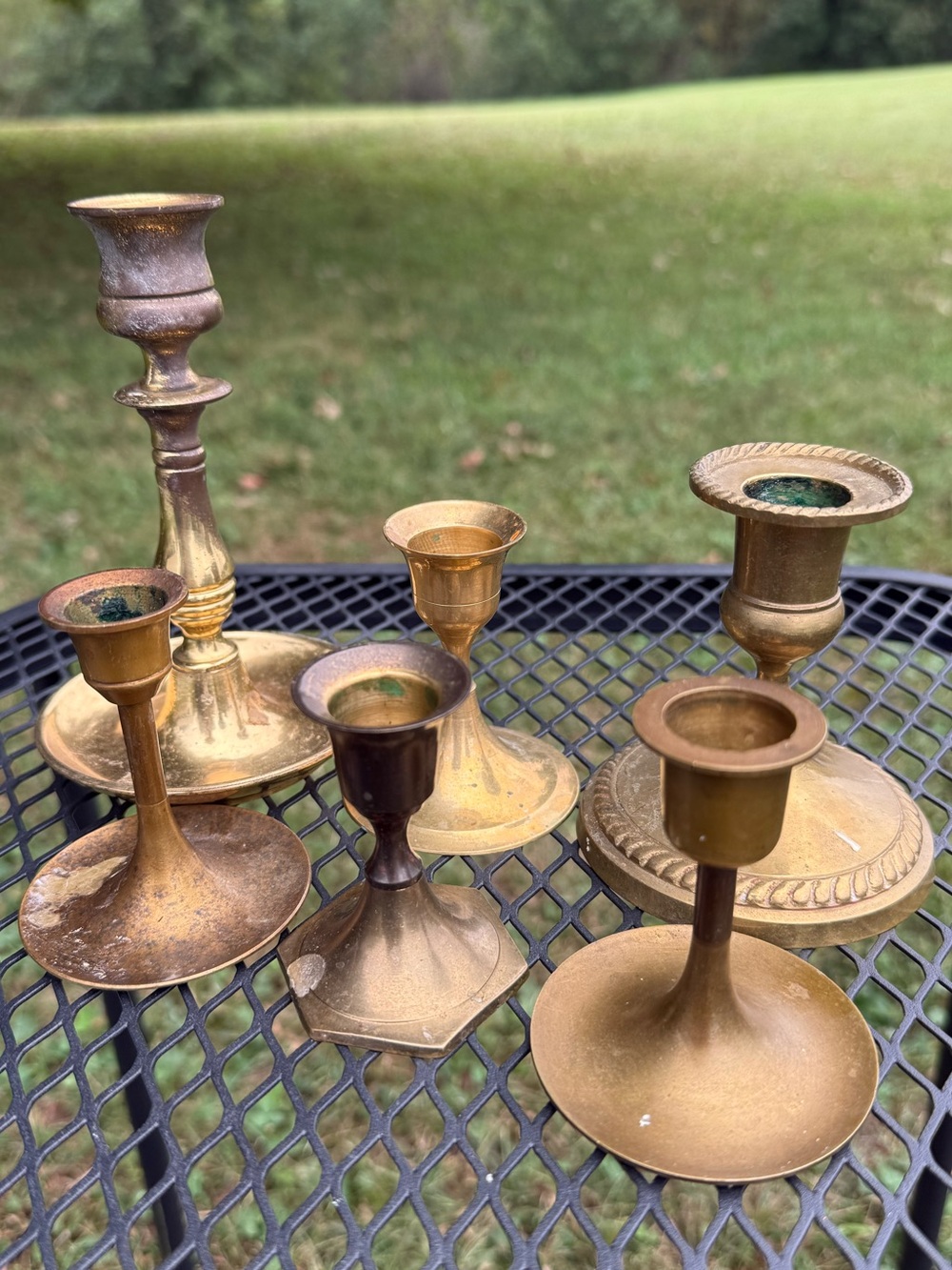 charming collection of vintage brass candlestick holders